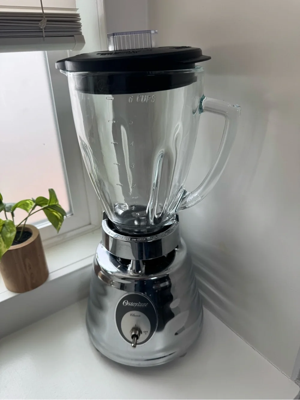 Vintage Oster Chrome Base Glass Jar Blender with Black Lid in pristine cobd