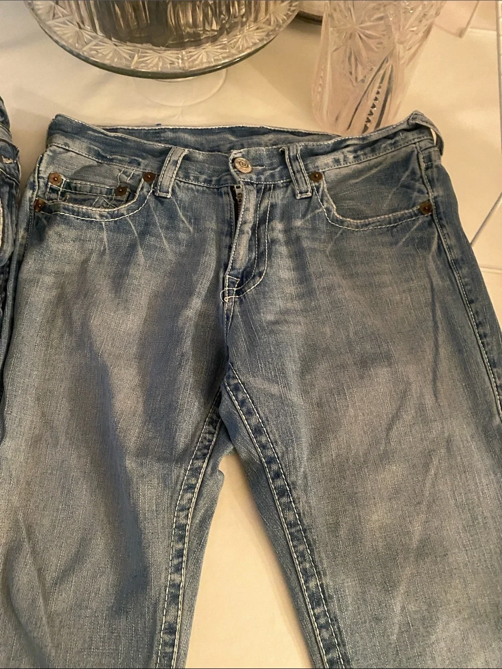 Two pairs of Vintage made in USA Men's True Religion Jeans.