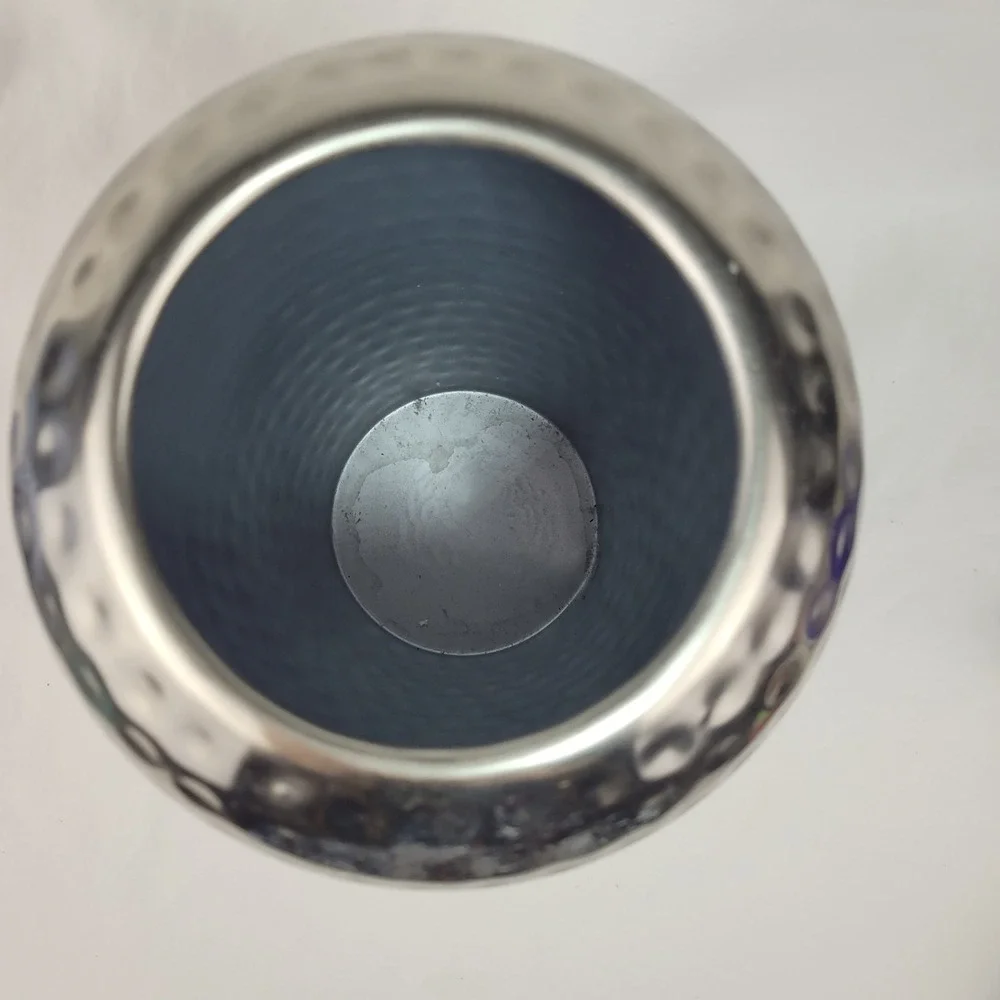 Unbranded hammered silver