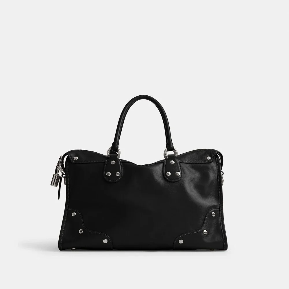 Coach purchased during