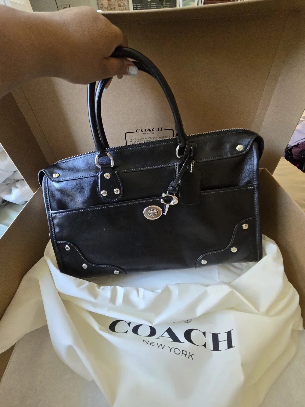 Coach purchased during