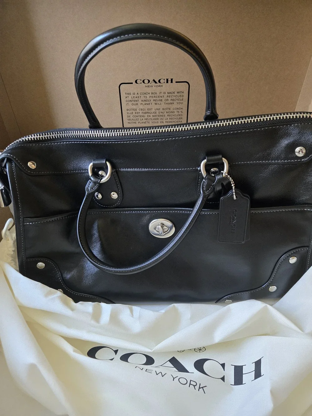 Coach purchased during
