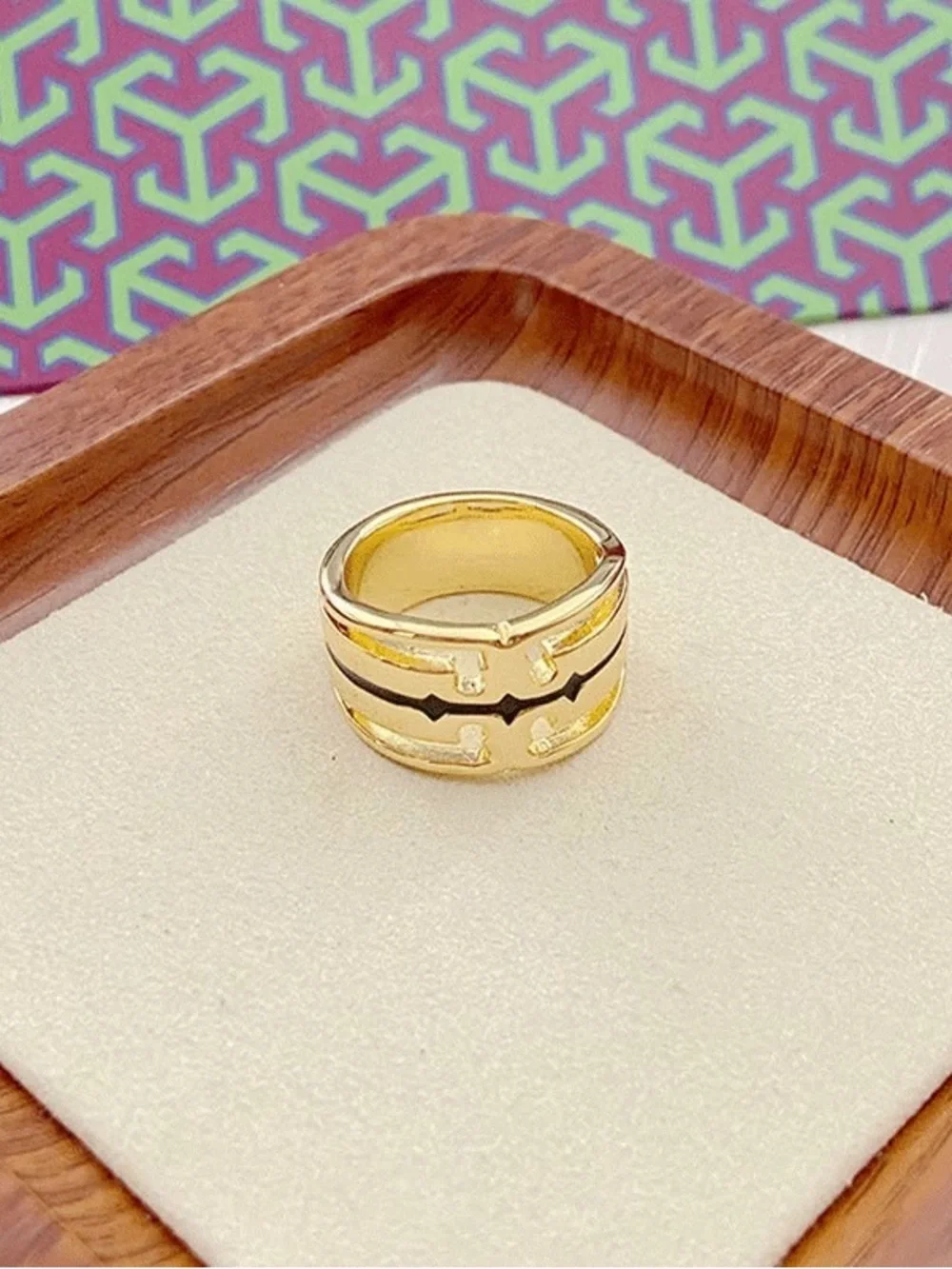 Tory Burch polished gold