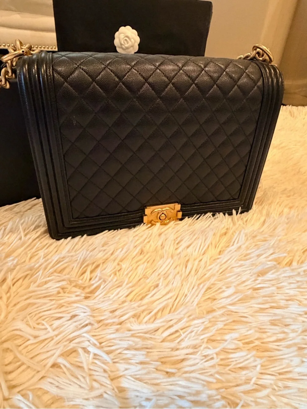 CHANEL Black Quilted Shoulder Bag with Gold Hardware and Chain Strap