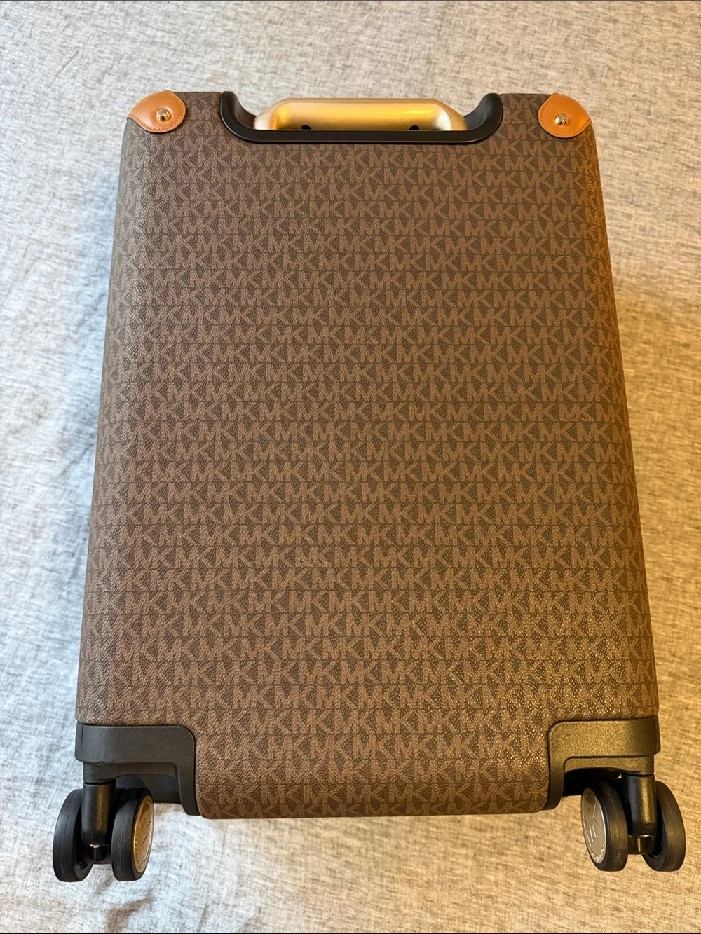 Michael Kors our logo