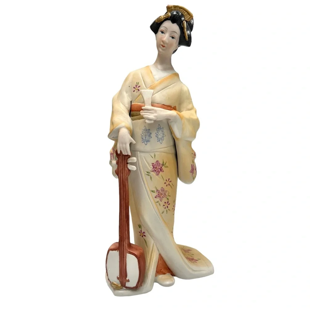 Vintage geisha holding