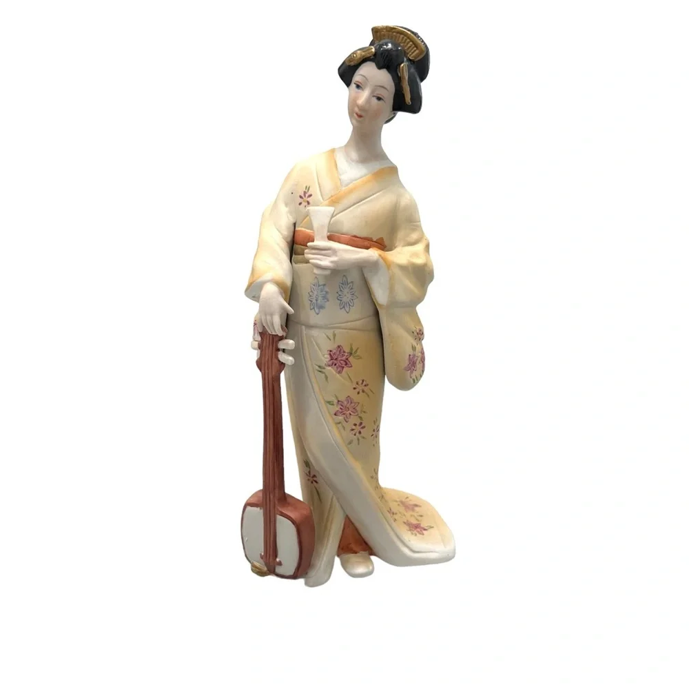 Vintage geisha holding