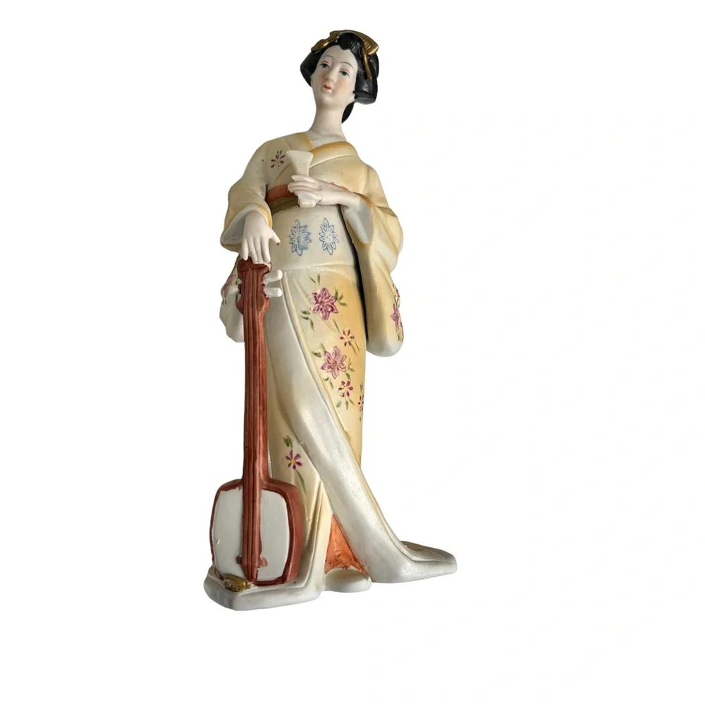 Vintage geisha holding