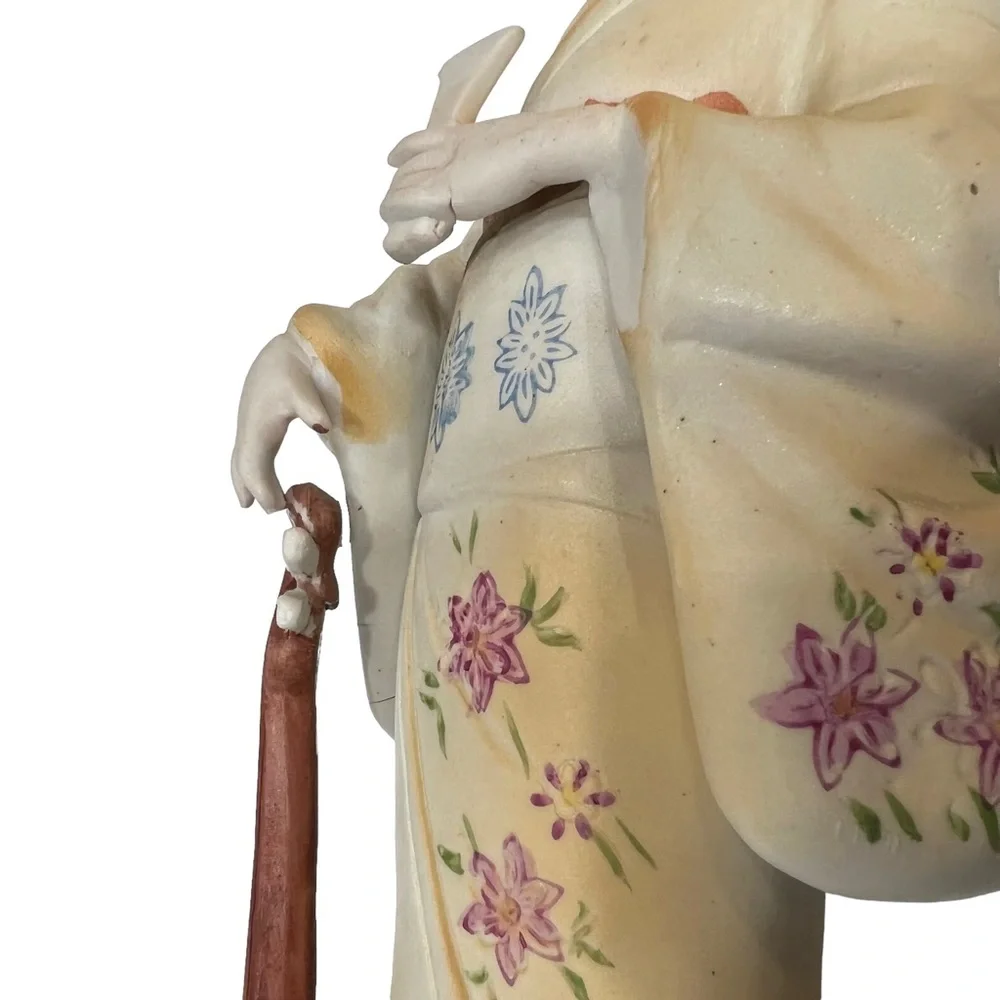 Vintage geisha holding