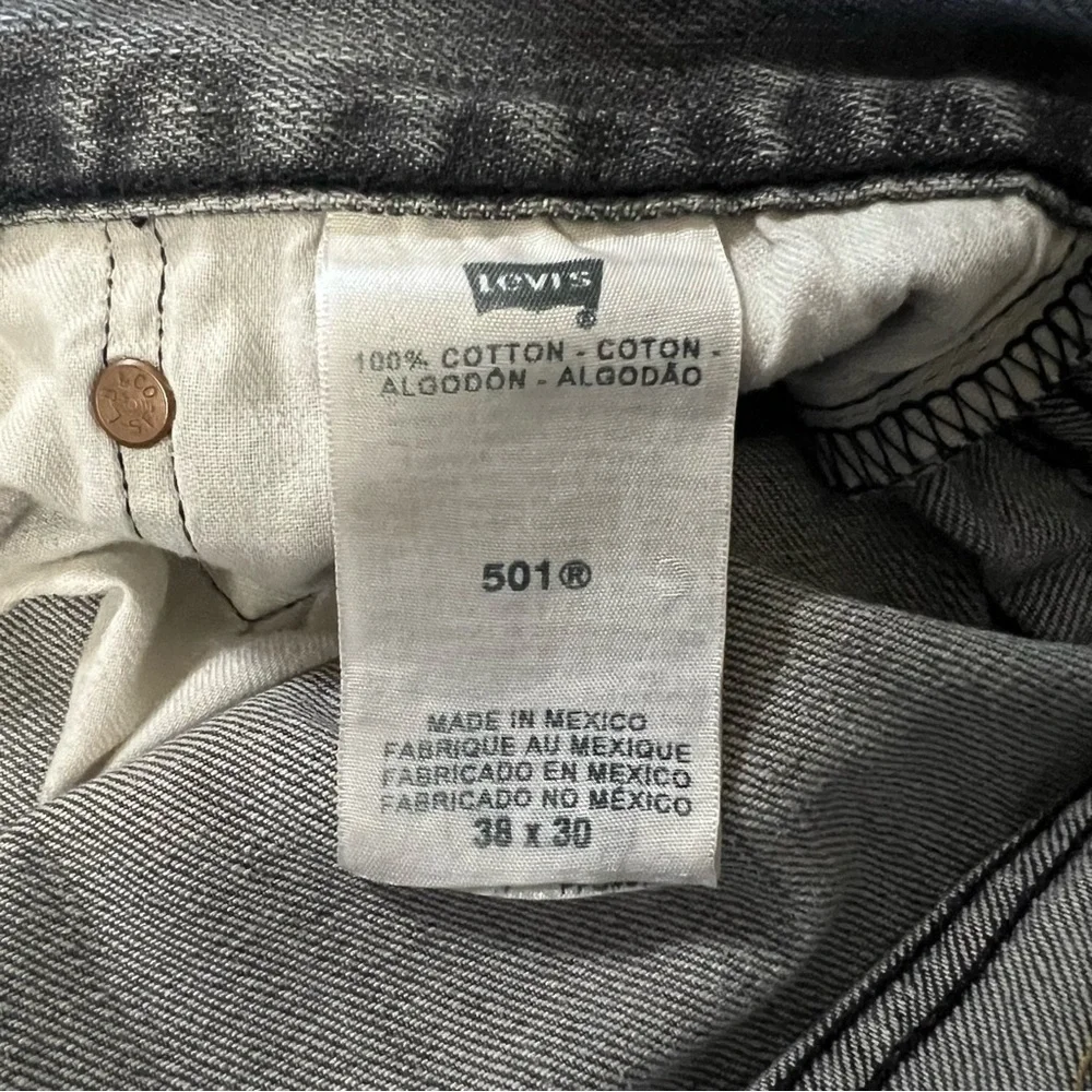 Levi’s 501 Straight Leg Faded Black Button Fly Jeans size 38 x 30