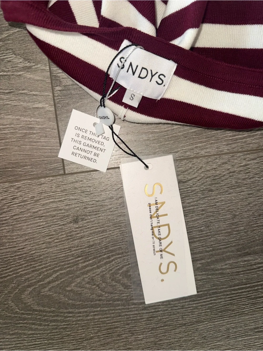 SNDYS. maroon white