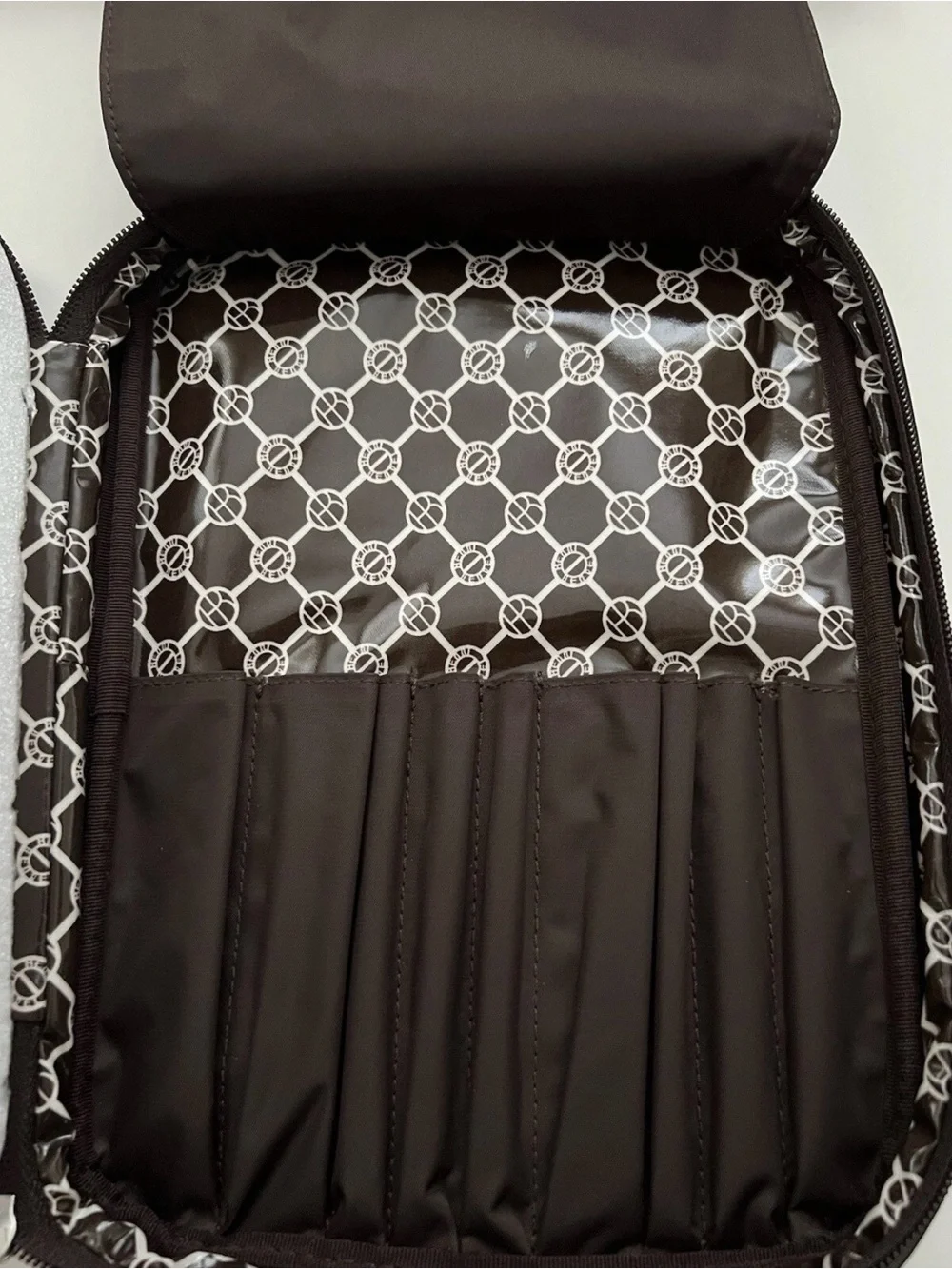 henri bendel pattern bag pockets