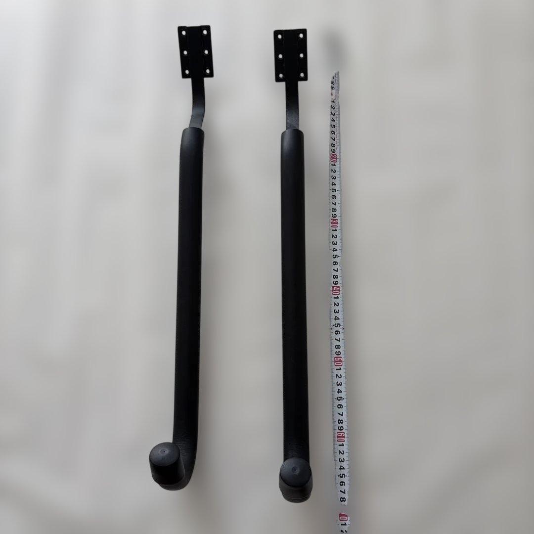 Wall-mounted surfboard rack