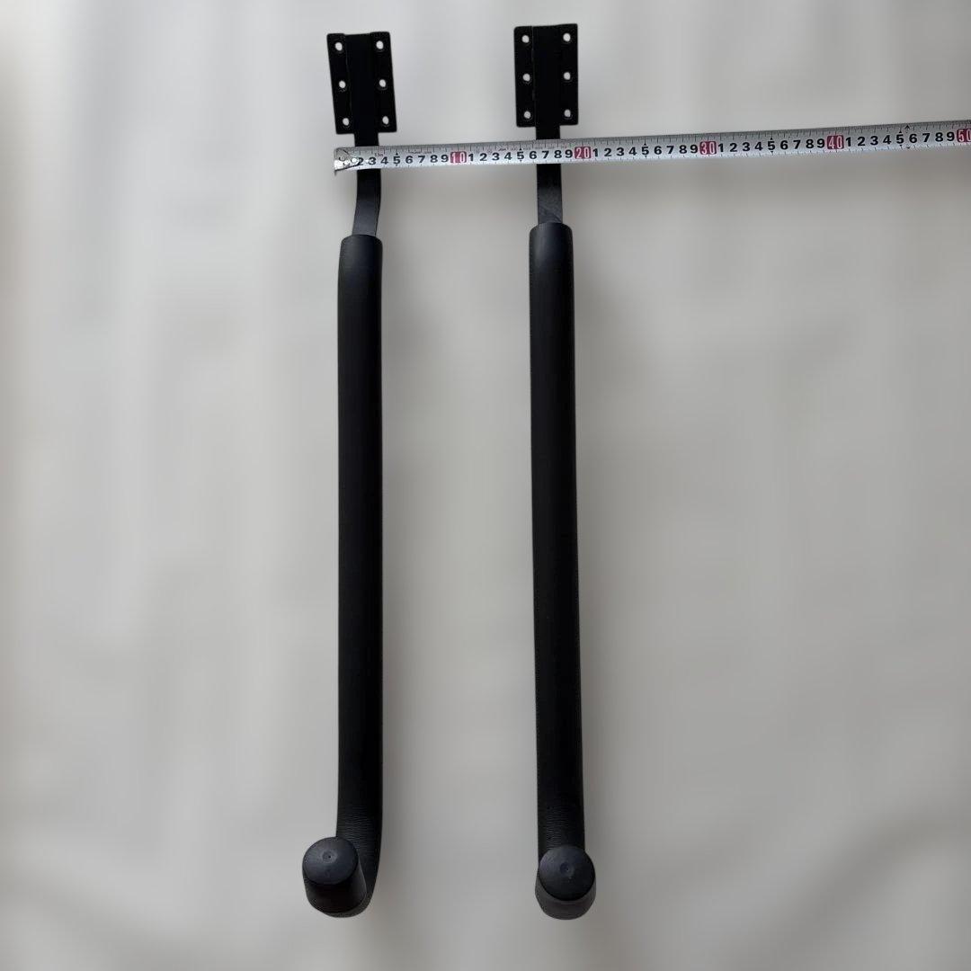 Wall-mounted surfboard rack